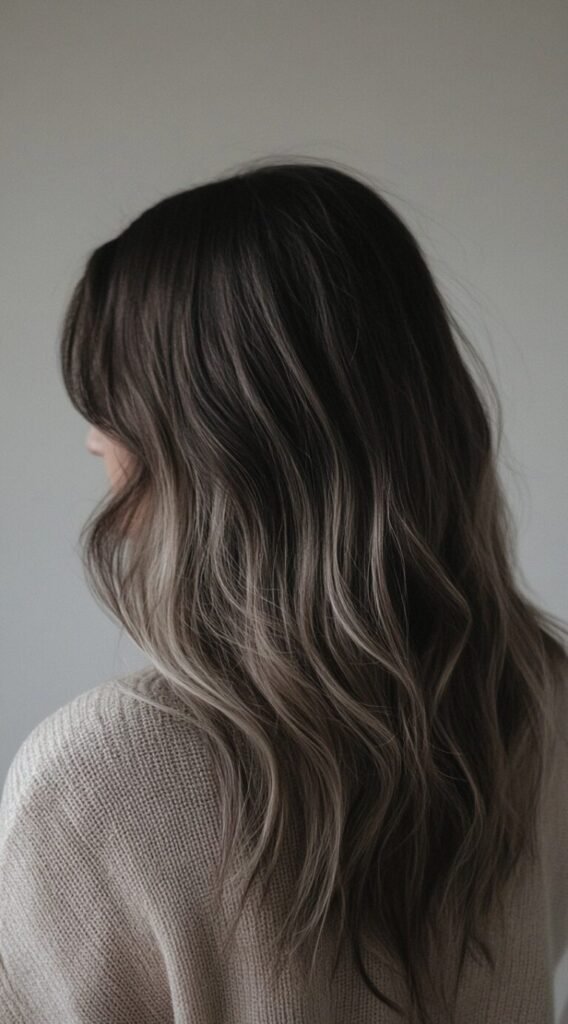 Smoky Ash Blonde Balayage on Wavy Layers